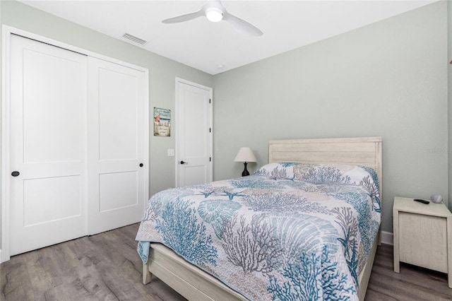 1119 Boundary Blvd, Rotonda West, FL 33947 - bedroom featuring wood finished floors, a closet, and ceiling fan
