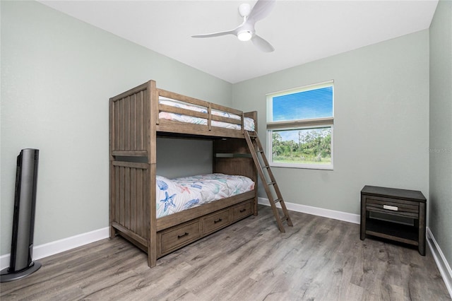 1119 Boundary Blvd, Rotonda West, FL 33947 - bedroom featuring wood finished floors and ceiling fan
