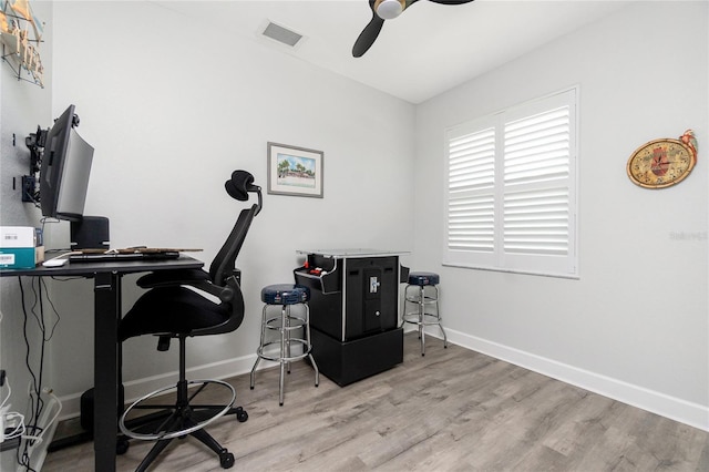 1119 Boundary Blvd, Rotonda West, FL 33947 - home office featuring wood finished floors and a ceiling fan