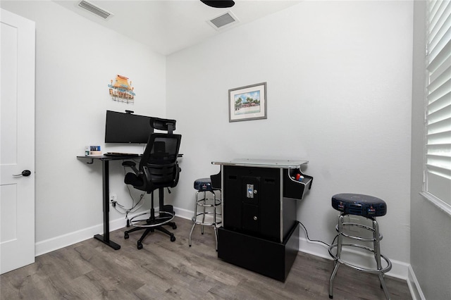 1119 Boundary Blvd, Rotonda West, FL 33947 - home office with wood finished floors and baseboards
