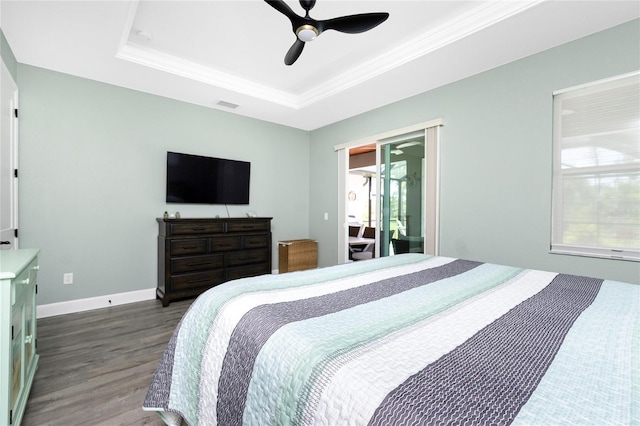 1119 Boundary Blvd, Rotonda West, FL 33947 - bedroom with a tray ceiling, wood finished floors, crown molding, and a ceiling fan