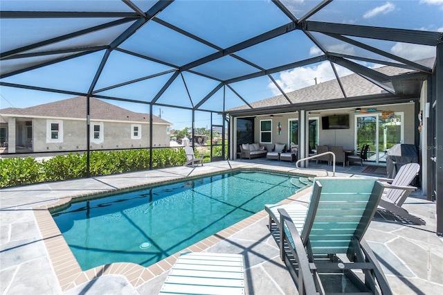 1119 Boundary Blvd, Rotonda West, FL 33947 - swimming pool with an outdoor hangout area, ceiling fan, a patio area, and a lanai