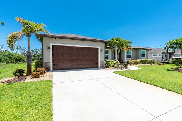 1119 Boundary Blvd, Rotonda West, FL 33947 - single story home with an attached garage, driveway, stone siding, a front yard, and stucco siding