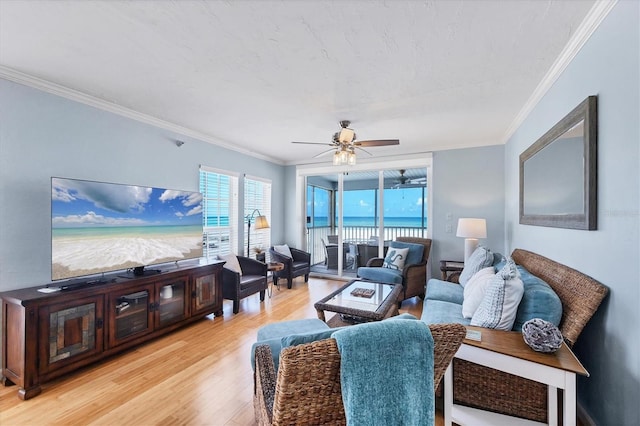 7554 Palm Island Dr S Unit 1813, Placida, FL 33946 - living area featuring light wood-style flooring, a ceiling fan, and crown molding