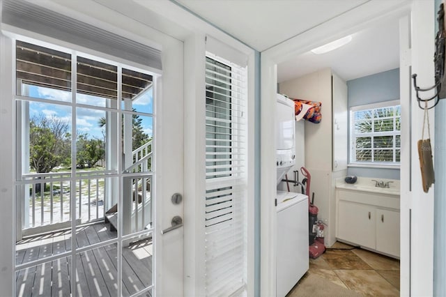 7554 Palm Island Dr S Unit 1813, Placida, FL 33946 - washroom featuring stacked washer and clothes dryer