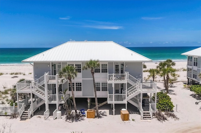 7554 Palm Island Dr S Unit 1813, Placida, FL 33946 - view of property with stairway and view of water and beach
