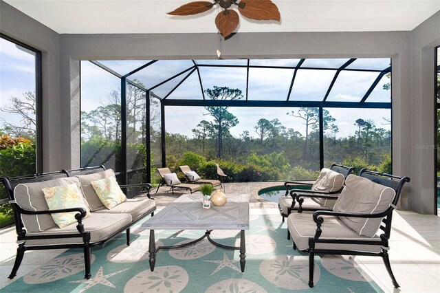 10487 Coquina Ct, Placida, FL 33946 - view of patio / terrace featuring an outdoor hangout area, glass enclosure, and a ceiling fan