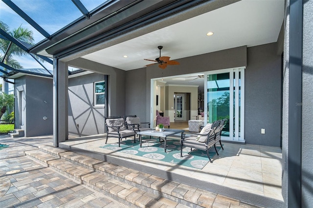 10487 Coquina Ct, Placida, FL 33946 - view of patio / terrace with ceiling fan and glass enclosure