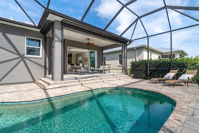 10487 Coquina Ct, Placida, FL 33946 - outdoor pool featuring a patio, ceiling fan, and a lanai
