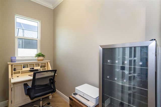 10487 Coquina Ct, Placida, FL 33946 - home office with crown molding and wood finished floors