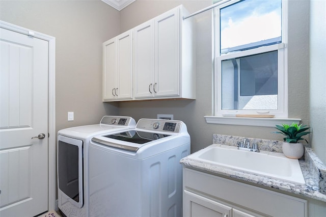 10487 Coquina Ct, Placida, FL 33946 - washroom featuring washer and clothes dryer and cabinet space