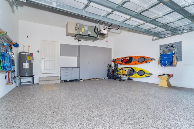 10487 Coquina Ct, Placida, FL 33946 - garage with water heater and a garage door opener