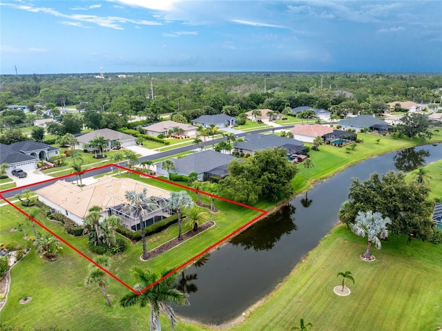 117 Abercrombie Ave, Englewood, FL 34223 - aerial view of residential area with property parcel outlined and a nearby body of water