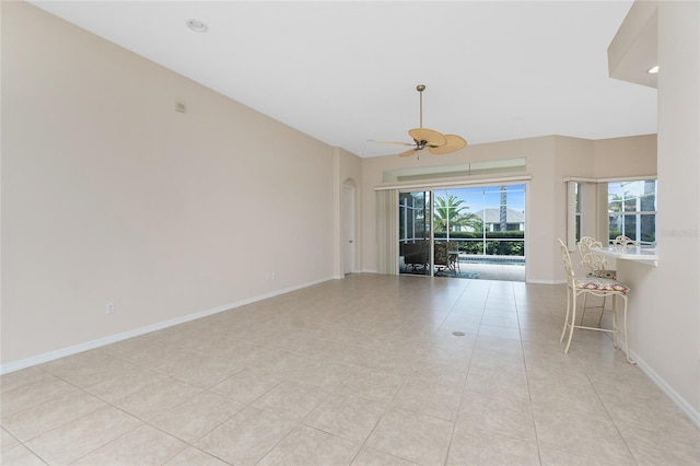 117 Abercrombie Ave, Englewood, FL 34223 - empty room featuring a ceiling fan, light tile patterned flooring, and recessed lighting