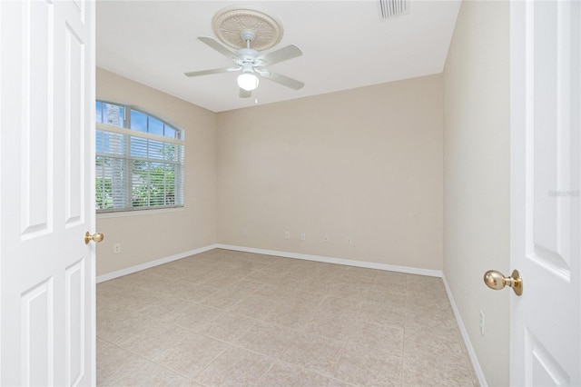 117 Abercrombie Ave, Englewood, FL 34223 - empty room with ceiling fan and light tile patterned flooring