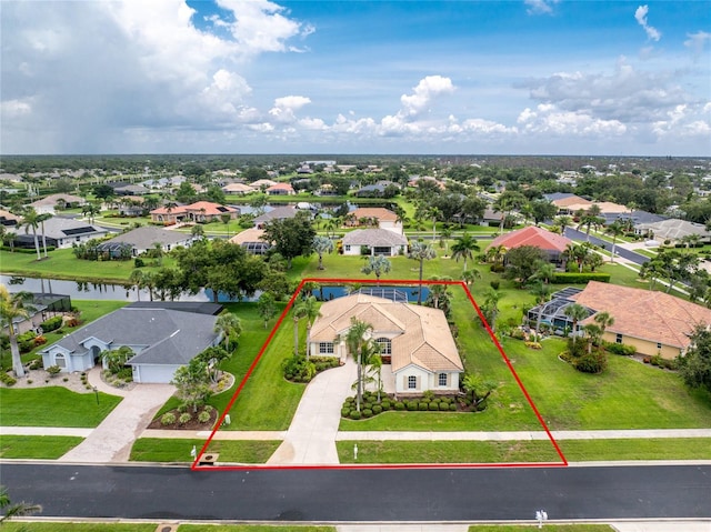 117 Abercrombie Ave, Englewood, FL 34223 - aerial view of residential area with property parcel outlined and a large body of water