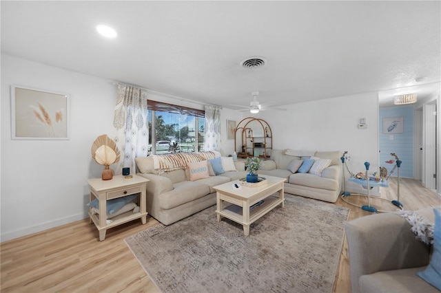 1730 Bluebird Ln, Englewood, FL 34224 - living room featuring light wood-style flooring and ceiling fan