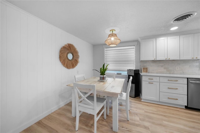1730 Bluebird Ln, Englewood, FL 34224 - dining area featuring light wood-type flooring