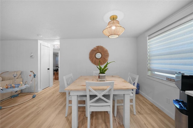 1730 Bluebird Ln, Englewood, FL 34224 - dining area featuring light wood-style floors