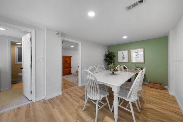 1730 Bluebird Ln, Englewood, FL 34224 - dining area with light wood finished floors and recessed lighting