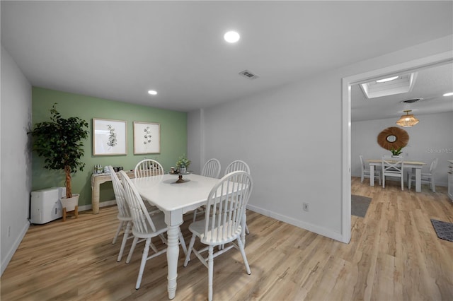 1730 Bluebird Ln, Englewood, FL 34224 - dining space featuring light wood-style floors and recessed lighting