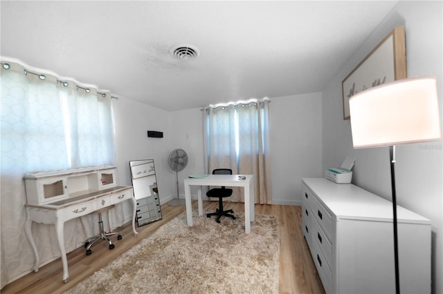 1730 Bluebird Ln, Englewood, FL 34224 - office space with light wood-style flooring