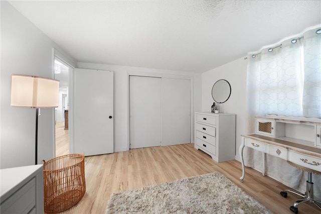 1730 Bluebird Ln, Englewood, FL 34224 - bedroom featuring light wood-style floors and a closet