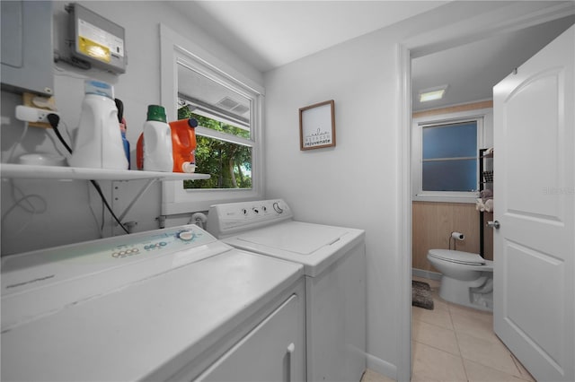 1730 Bluebird Ln, Englewood, FL 34224 - washroom featuring independent washer and dryer and light tile patterned flooring