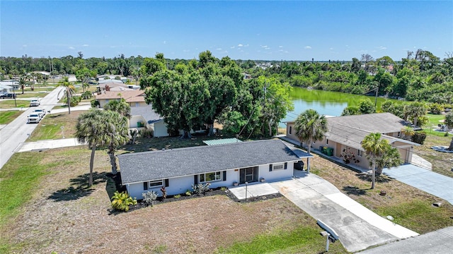 1730 Bluebird Ln, Englewood, FL 34224 - view of subject property featuring a nearby body of water and a tree filled landscape
