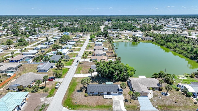 1730 Bluebird Ln, Englewood, FL 34224 - aerial perspective of suburban area with a large body of water