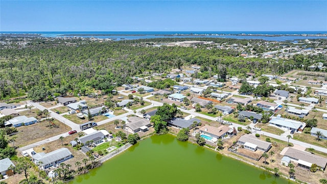 1730 Bluebird Ln, Englewood, FL 34224 - aerial perspective of suburban area featuring a nearby body of water