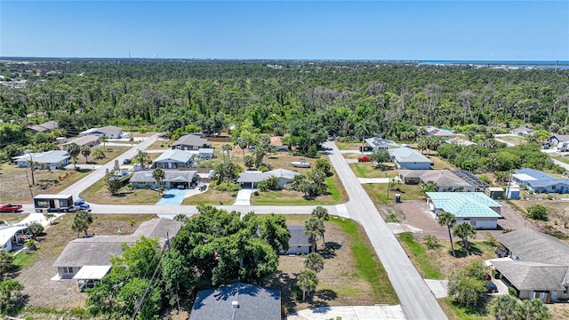 1730 Bluebird Ln, Englewood, FL 34224 - aerial view of residential area featuring a heavily wooded area