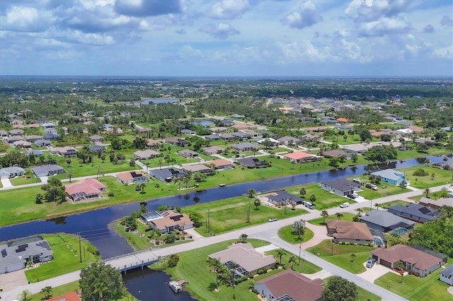 727 Rotonda Cir, Rotonda West, FL 33947 - aerial view of residential area featuring a nearby body of water