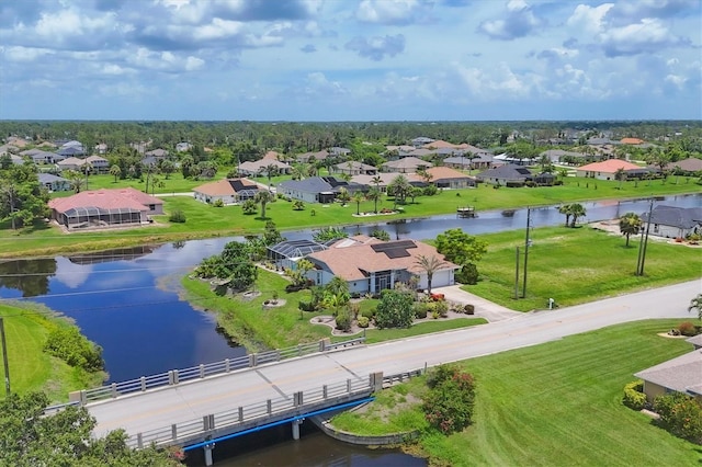 727 Rotonda Cir, Rotonda West, FL 33947 - aerial view of residential area with a large body of water