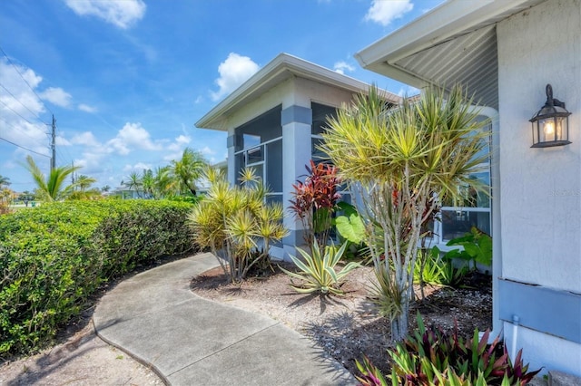 727 Rotonda Cir, Rotonda West, FL 33947 - view of home's exterior featuring stucco siding