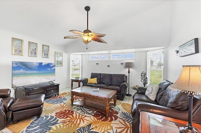 727 Rotonda Cir, Rotonda West, FL 33947 - living area with high vaulted ceiling, tile patterned floors, and a ceiling fan