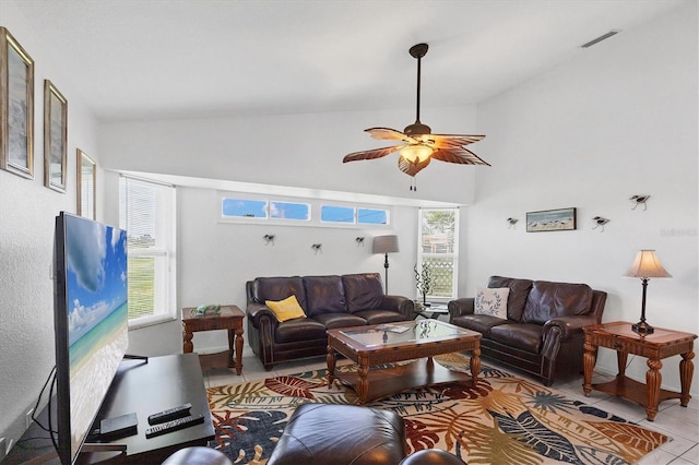 727 Rotonda Cir, Rotonda West, FL 33947 - living room with a ceiling fan and high vaulted ceiling