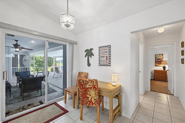 727 Rotonda Cir, Rotonda West, FL 33947 - dining space featuring light tile patterned flooring, a ceiling fan, and vaulted ceiling