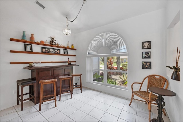 727 Rotonda Cir, Rotonda West, FL 33947 - indoor dry bar featuring decorative light fixtures