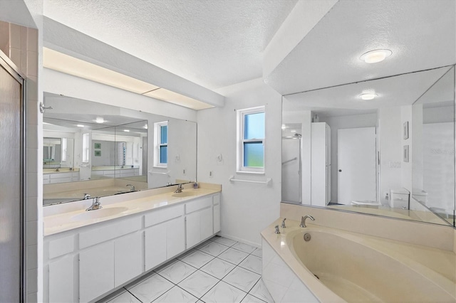 727 Rotonda Cir, Rotonda West, FL 33947 - full bath featuring a textured ceiling, a bath, double vanity, and tile patterned floors