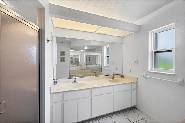 727 Rotonda Cir, Rotonda West, FL 33947 - bathroom with a stall shower, double vanity, and marble look tile flooring