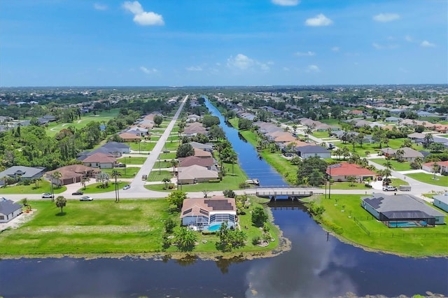 727 Rotonda Cir, Rotonda West, FL 33947 - aerial perspective of suburban area featuring a large body of water