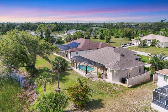 39 Pine Valley Ct, Rotonda West, FL 33947 - aerial view at dusk of view of pool