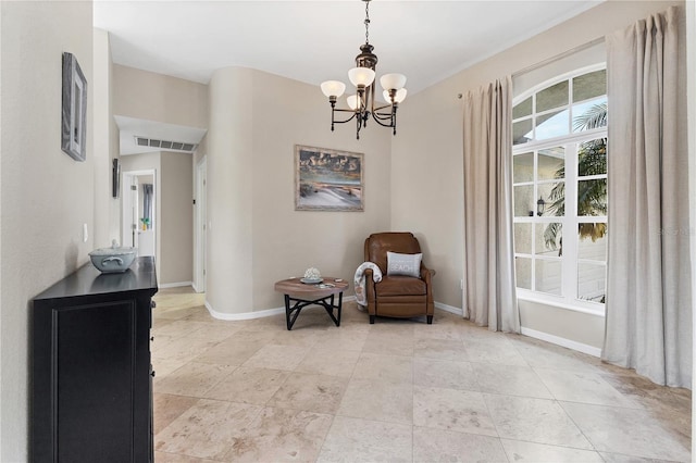 39 Pine Valley Ct, Rotonda West, FL 33947 - living area with a chandelier and baseboards