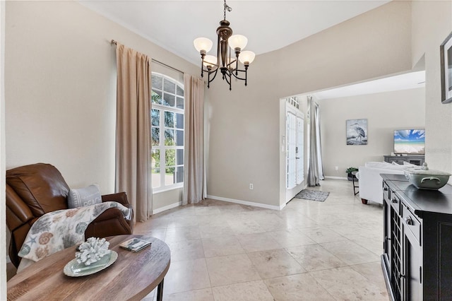 39 Pine Valley Ct, Rotonda West, FL 33947 - sitting room featuring a chandelier and light tile patterned floors