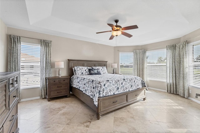 39 Pine Valley Ct, Rotonda West, FL 33947 - bedroom featuring a raised ceiling, a ceiling fan, and light tile patterned floors