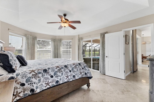39 Pine Valley Ct, Rotonda West, FL 33947 - bedroom with access to outside, a ceiling fan, and light tile patterned floors