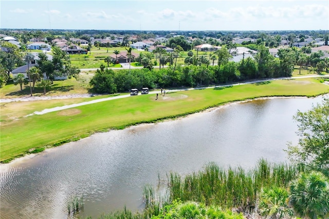 39 Pine Valley Ct, Rotonda West, FL 33947 - aerial perspective of suburban area with a golf course and a nearby body of water