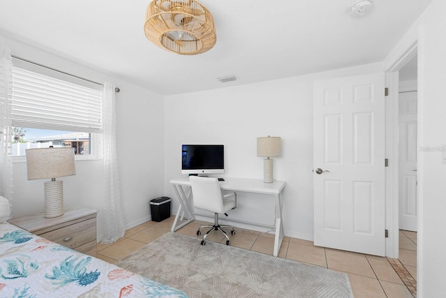 1060 Haste Ln, Englewood, FL 34223 - tiled bedroom with a desk