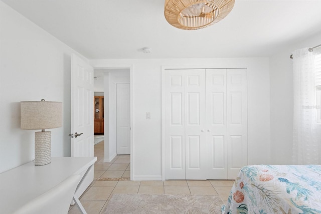 1060 Haste Ln, Englewood, FL 34223 - bedroom featuring light tile patterned floors and a closet